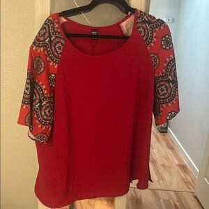 Trendy Red Blouse with Patterned Sleeves